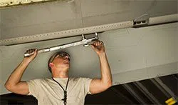 GarageDoorsStore College Point, NY 347-363-6140 - garage-door-maintainence-side